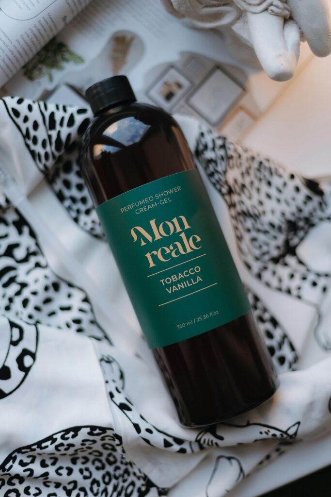 Luxury Perfumed Shower Gel Bottle on Patterned Fabric
